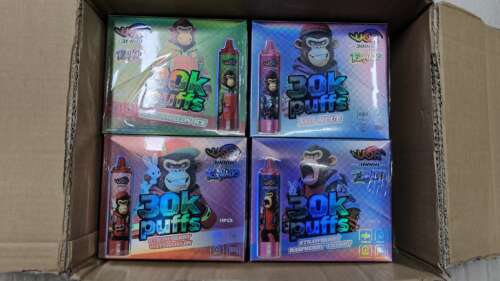 Colorful cardboard boxes featuring cartoon monkeys and bottles, labeled "30k puffs" in a cardboard box pack.